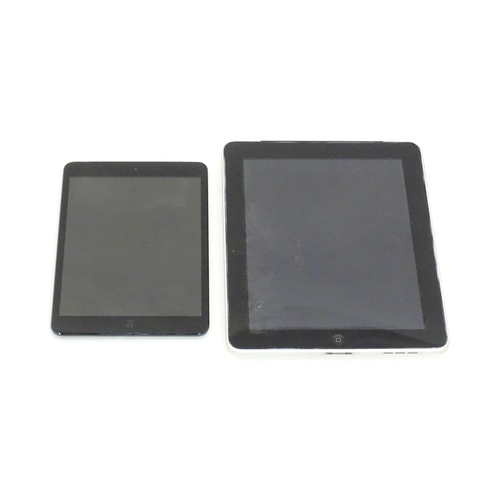 490 - Two Apple iPads to comprising a silver iPad Model A1337 and a black iPad Mini Model A1455 (2)