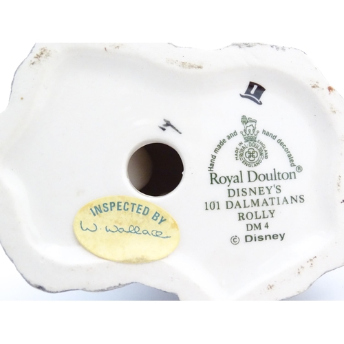 506 - Two Royal Doulton Disney figures comprising Pooh and the Honey Pot WP1, and 101 Dalmatians Rolly DM ... 