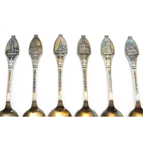 516 - 6 Danish silver plate souvenir spoons. Titles Kobenhavn / Copenhagen, the handles decorated with var... 