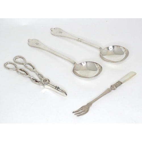 520 - Silver plated wares comprising a pair of silver plate trefid spoons marked Finnigans, a pickle fork ... 