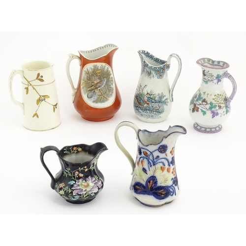 817 - Six assorted 19thC and later jugs to include a Masons ironstone example in the Black Chinese pattern... 