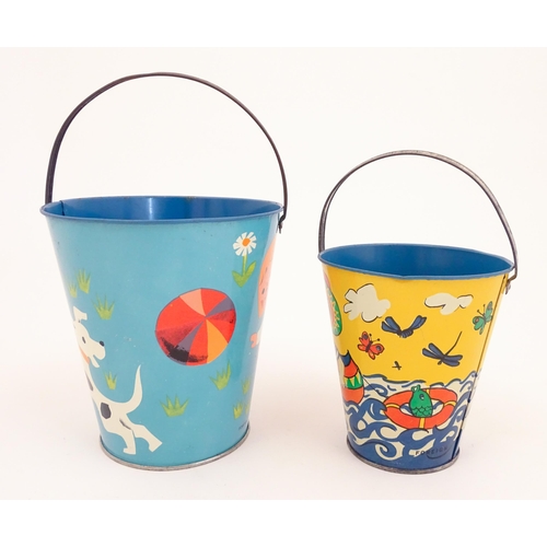 818 - Two vintage tin seaside buckets with swing handles, decorated with children playing. Largest approx.... 