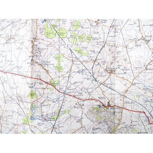 822 - A quantity of mid 20thC maps, including Geographia Ramblers' Map - Isle of Wight, Ordnance Survey on... 