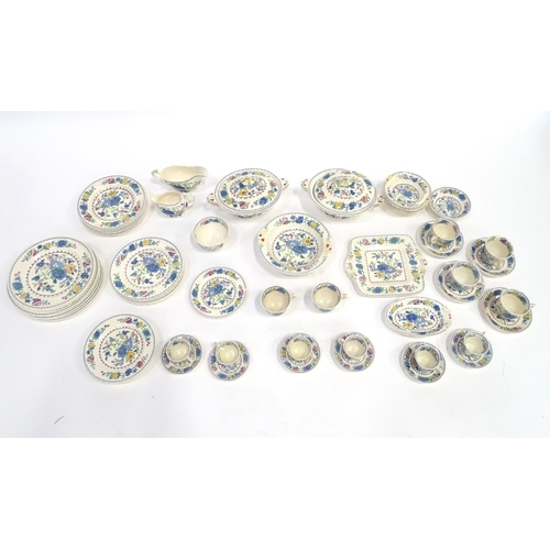 103 - A quantity of Masons dinner wares decorated in the Regency pattern to include plates, bowls, tureens... 