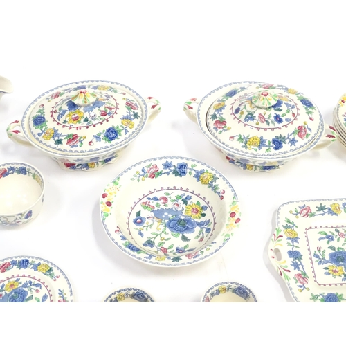 103 - A quantity of Masons dinner wares decorated in the Regency pattern to include plates, bowls, tureens... 