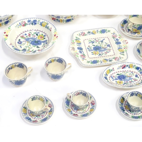 103 - A quantity of Masons dinner wares decorated in the Regency pattern to include plates, bowls, tureens... 