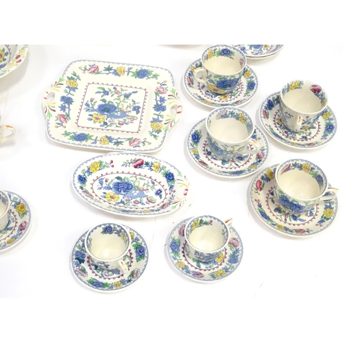 103 - A quantity of Masons dinner wares decorated in the Regency pattern to include plates, bowls, tureens... 