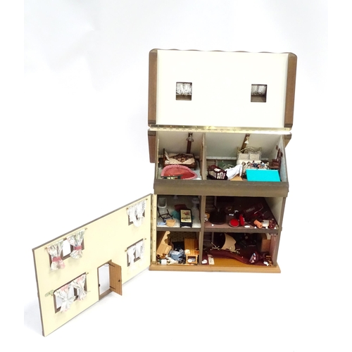 250 - A mid 20thC dolls house, the front and roof opening to reveal six rooms containing assorted dolls ho... 