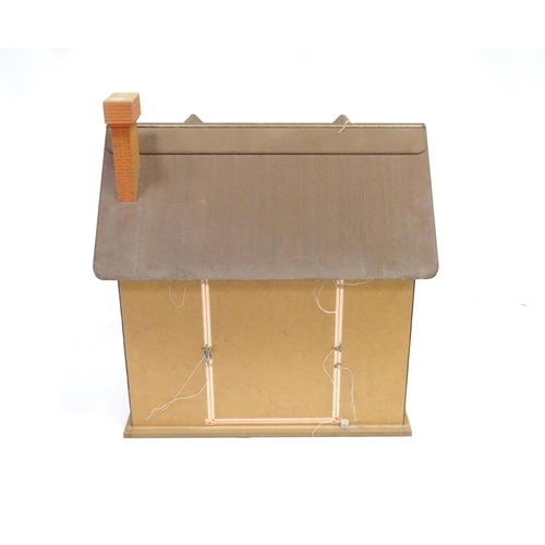 250 - A mid 20thC dolls house, the front and roof opening to reveal six rooms containing assorted dolls ho... 