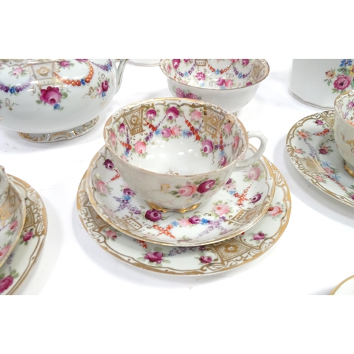 277 - A quantity of assorted tea / coffee wares to include cups and saucers, trios, cake / sandwich plates... 