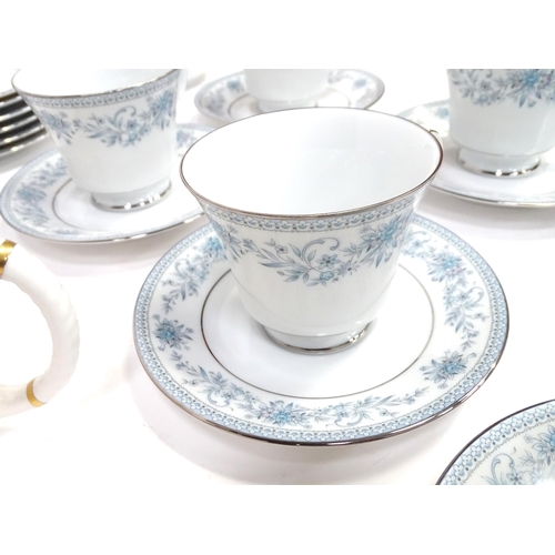 277 - A quantity of assorted tea / coffee wares to include cups and saucers, trios, cake / sandwich plates... 