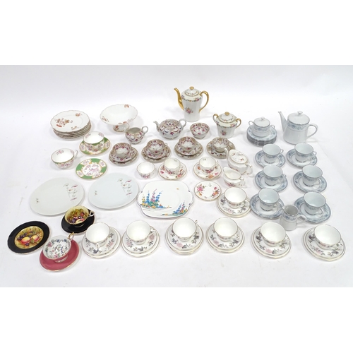 277 - A quantity of assorted tea / coffee wares to include cups and saucers, trios, cake / sandwich plates... 