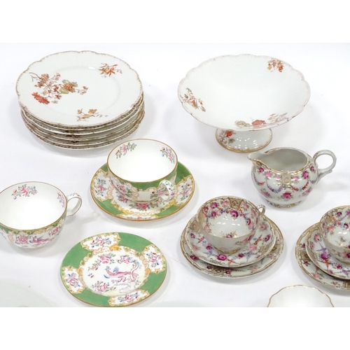 277 - A quantity of assorted tea / coffee wares to include cups and saucers, trios, cake / sandwich plates... 