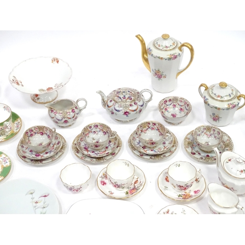 277 - A quantity of assorted tea / coffee wares to include cups and saucers, trios, cake / sandwich plates... 