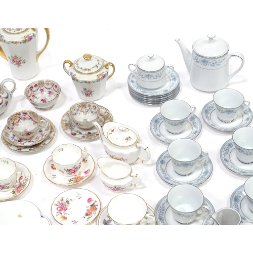 277 - A quantity of assorted tea / coffee wares to include cups and saucers, trios, cake / sandwich plates... 