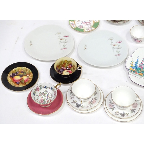 277 - A quantity of assorted tea / coffee wares to include cups and saucers, trios, cake / sandwich plates... 