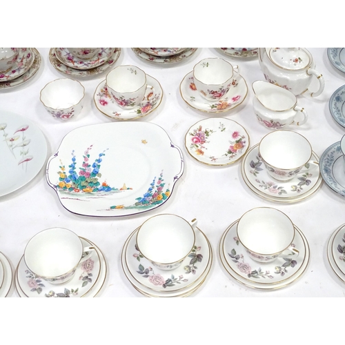 277 - A quantity of assorted tea / coffee wares to include cups and saucers, trios, cake / sandwich plates... 