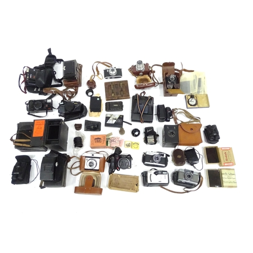 291 - A quantity of assorted cameras and accessories to include Miranda A-X DX 35mm, kodak ek160 instant c... 