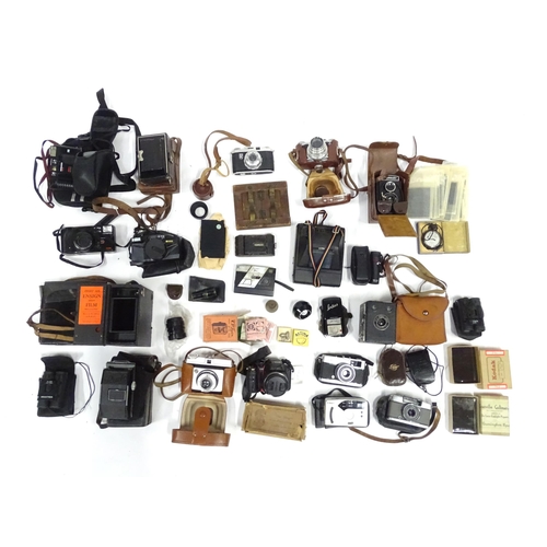 291 - A quantity of assorted cameras and accessories to include Miranda A-X DX 35mm, kodak ek160 instant c... 