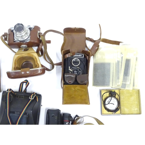 291 - A quantity of assorted cameras and accessories to include Miranda A-X DX 35mm, kodak ek160 instant c... 