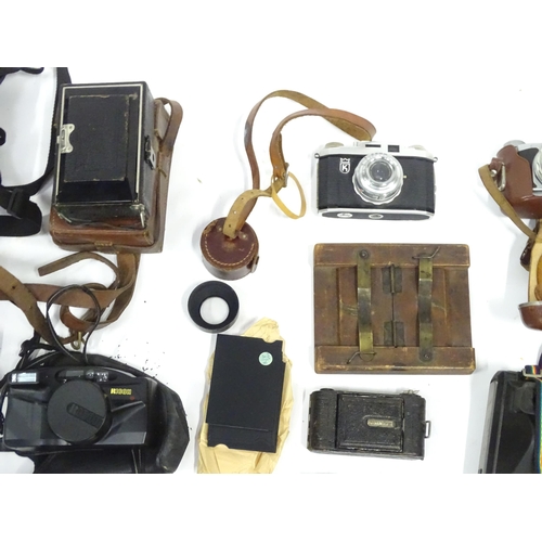 291 - A quantity of assorted cameras and accessories to include Miranda A-X DX 35mm, kodak ek160 instant c... 