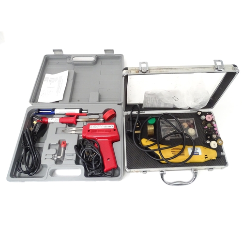 394 - A cased soldering iron tool set, together with a cased rotary sanding / polishing / engraving tool s... 