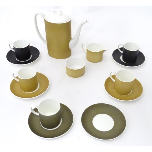 410 - A quantity of assorted Susie Cooper coffee wares to include the Carnaby Daisy pattern, comprising te... 