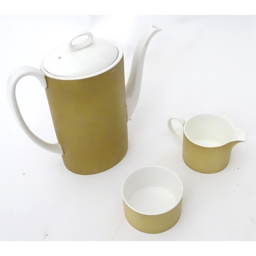 410 - A quantity of assorted Susie Cooper coffee wares to include the Carnaby Daisy pattern, comprising te... 