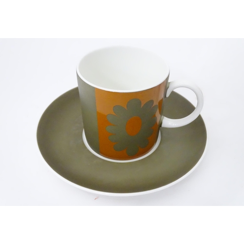 410 - A quantity of assorted Susie Cooper coffee wares to include the Carnaby Daisy pattern, comprising te... 