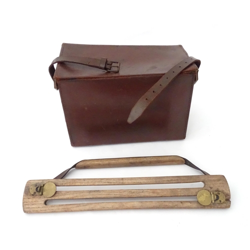 428 - Shooting : an early 20thC partridge game carrier , together with an associated leather box, the carr... 