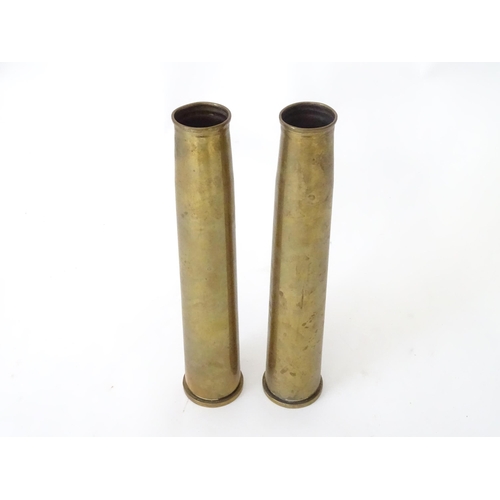 461 - Two brass 40mm Bofors cannon shell cases, each bearing Ministry of Defence forward arrow marks and d... 