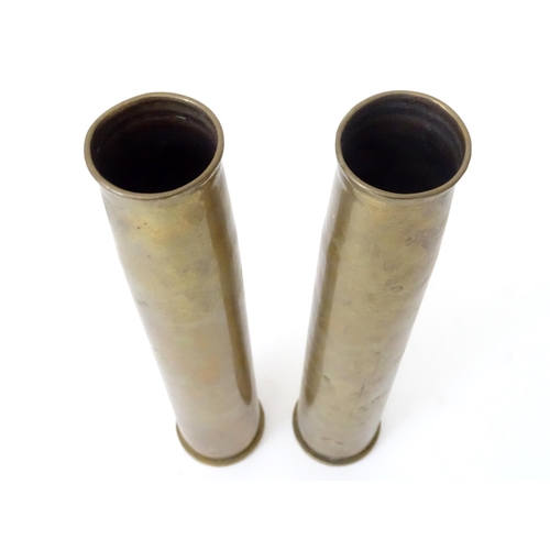 461 - Two brass 40mm Bofors cannon shell cases, each bearing Ministry of Defence forward arrow marks and d... 