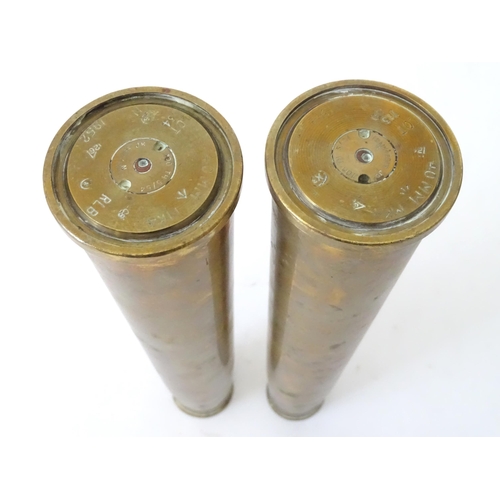 461 - Two brass 40mm Bofors cannon shell cases, each bearing Ministry of Defence forward arrow marks and d... 