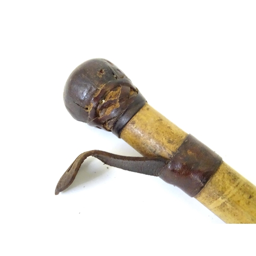 491 - A late 19thC Priest ( dispatching tool ), the mallaca handle with leather wrapping, belt eyelet, str... 