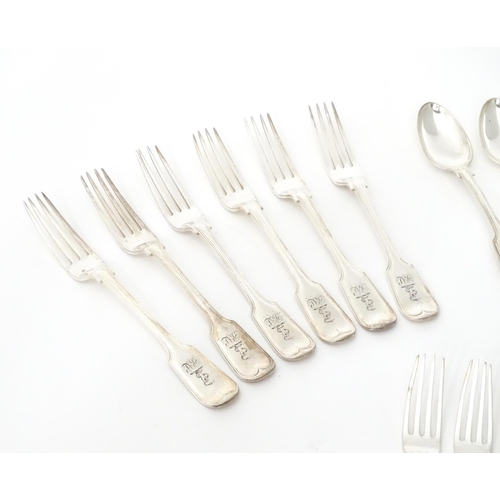 513 - A quantity of assorted silver plate flatware / cutlery by Elkington & Co. Together with a silver nap... 