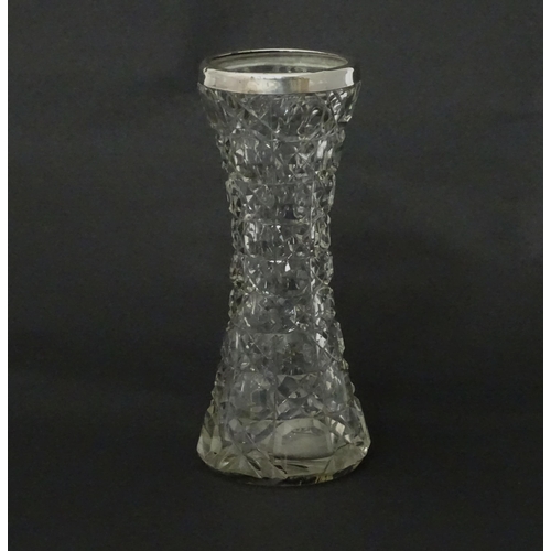 542 - A cut glass vase with silver rim, hallmarked Birmingham c.1901. Approx 7 1/2