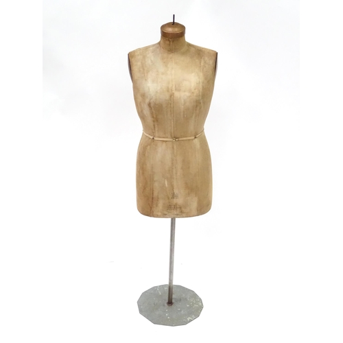 109 - A 20thC dressmaker's / tailor's female mannequin / dummy, stamped Bellows Machine Co. Ltd. Approx. 6... 