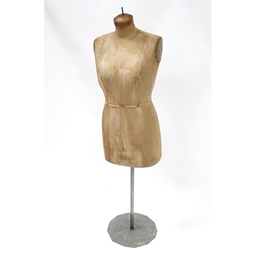 109 - A 20thC dressmaker's / tailor's female mannequin / dummy, stamped Bellows Machine Co. Ltd. Approx. 6... 