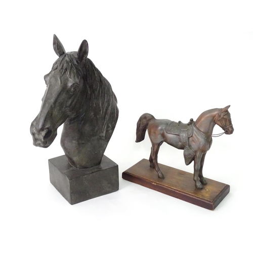 130 - A 20thC cast model of a horse head on a squared plinth. Together with a cast model of a standing hor... 