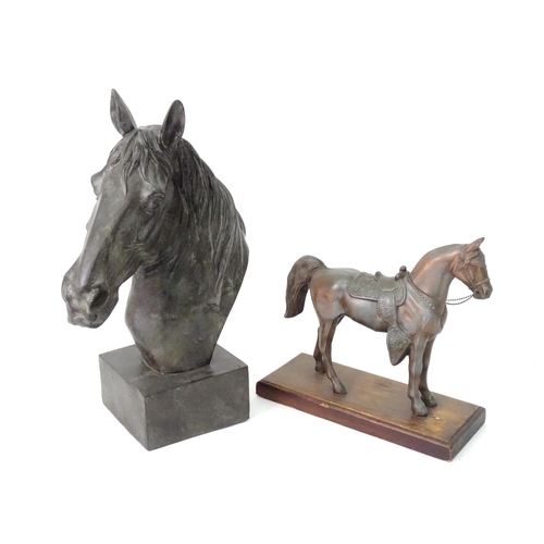 130 - A 20thC cast model of a horse head on a squared plinth. Together with a cast model of a standing hor... 