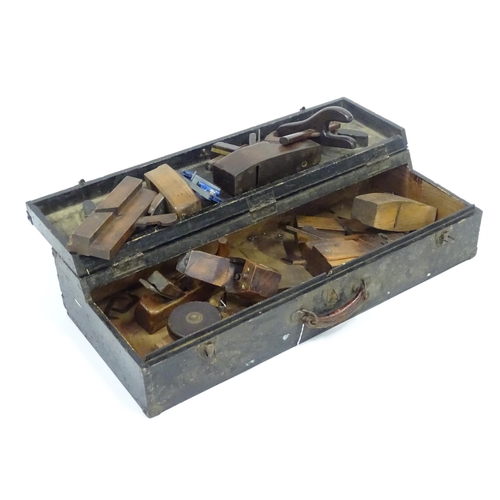 193 - An early to mid 20thC Carpenter's toolbox, containing a quantity of woodworking tools including an A... 