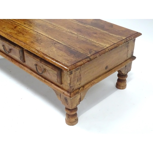 249 - A coffee table with six drawers, approx 43