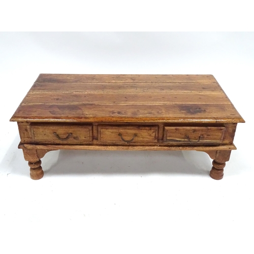 249 - A coffee table with six drawers, approx 43