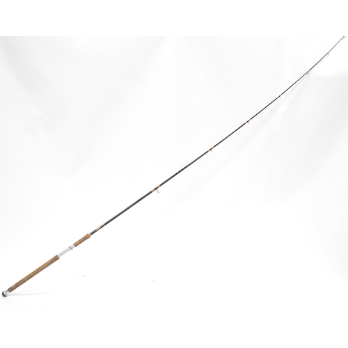 290 - Fishing : a c1970s Hardy's 8 1/2' two-piece 'Fibalite Spinning' rod, with Hardy's cloth case.