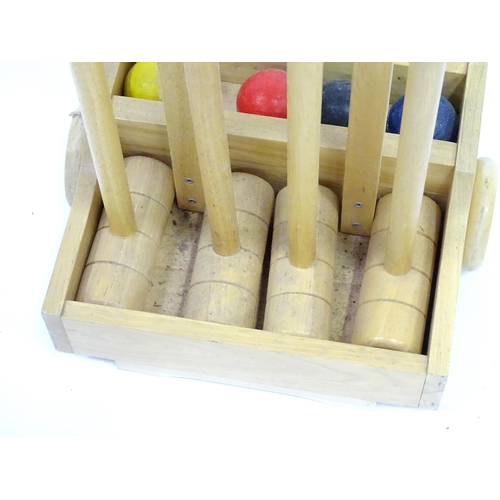 293 - A Croquet set on portable stand, approx 38