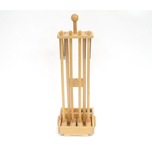 293 - A Croquet set on portable stand, approx 38