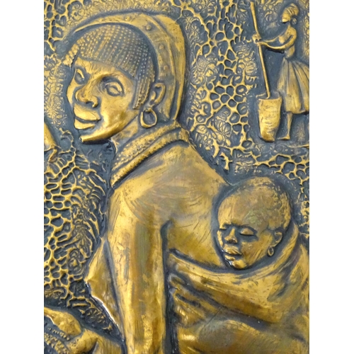 327 - A copper plaque depicting a mother and child. Signed under 'Handmade in S Rhodesia... Vera Maw'. App... 