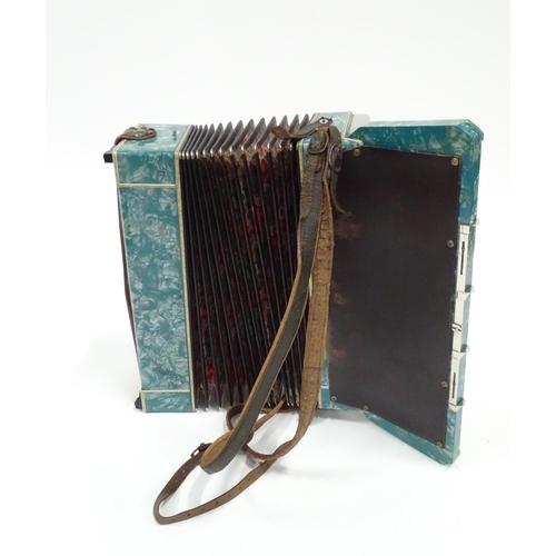 328 - Musical Instrument : a cased mid 20thC Frontalini accordion, with blue pearloid panels, 41 keys and ... 