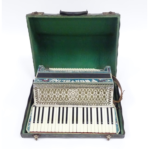 328 - Musical Instrument : a cased mid 20thC Frontalini accordion, with blue pearloid panels, 41 keys and ... 