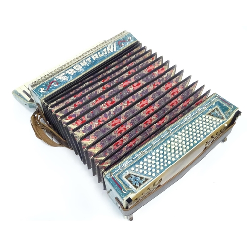 328 - Musical Instrument : a cased mid 20thC Frontalini accordion, with blue pearloid panels, 41 keys and ... 